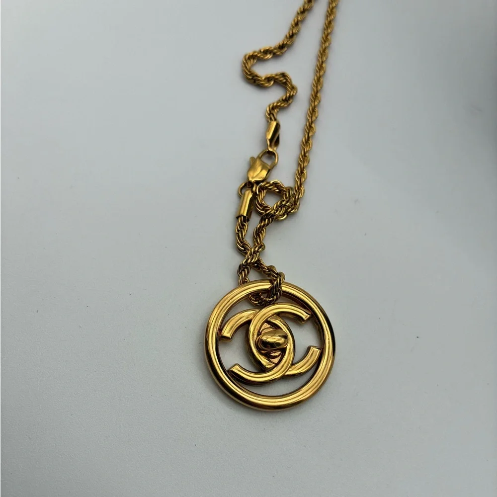 Chanel Gold-Tone CC turn lock Pendant necklace